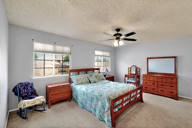 4821 Abbott Ave, Arlington, TX 76018 - bedroom with carpet flooring, a ceiling fan, and a textured ceiling