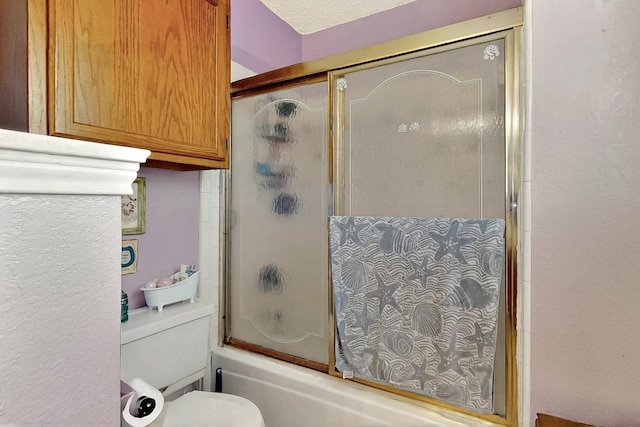 4821 Abbott Ave, Arlington, TX 76018 - full bath featuring shower / bath combination with glass door and toilet