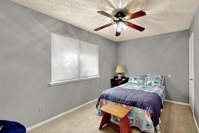 4821 Abbott Ave, Arlington, TX 76018 - bedroom featuring carpet floors, baseboards, a textured ceiling, and ceiling fan