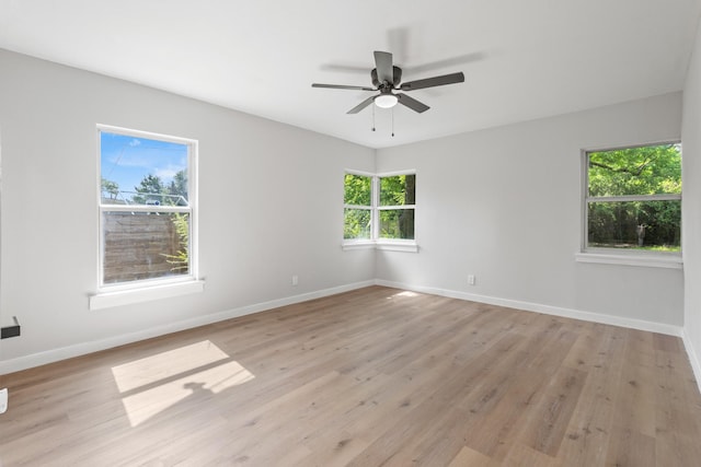 1304 Barnes Dr, Arlington, TX 76013 - unfurnished room featuring a ceiling fan, baseboards, and light wood finished floors