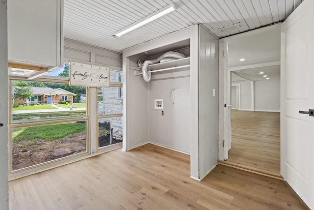 1304 Barnes Dr, Arlington, TX 76013 - washroom with light wood-style floors and hookup for a washing machine