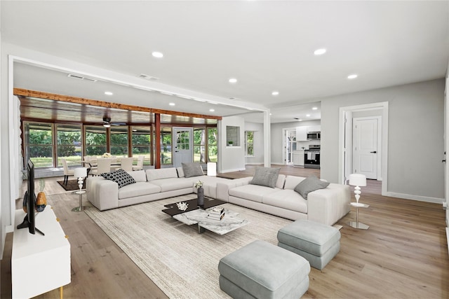 1304 Barnes Dr, Arlington, TX 76013 - living area with recessed lighting, light wood-style floors, baseboards, healthy amount of natural light, and a ceiling fan