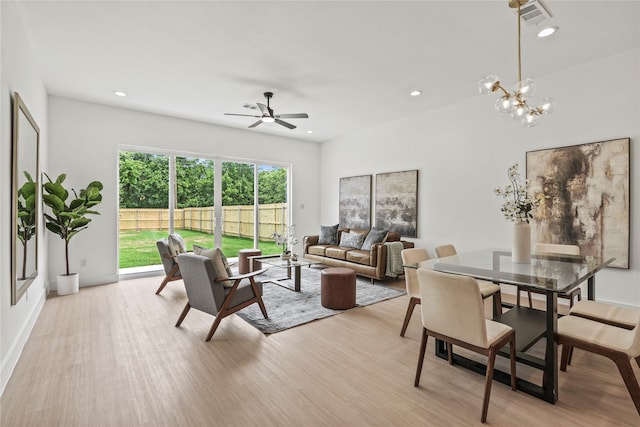 2522 Jeffries St, Dallas, TX 75215 - living area with light wood-style floors, ceiling fan, recessed lighting, and a chandelier