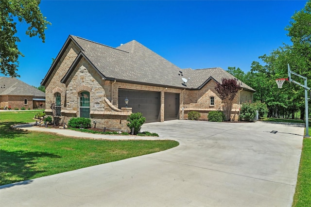 726 County Road 3355, Paradise, TX 76073 - french country inspired facade with an attached garage, a front yard, a shingled roof, concrete driveway, and brick siding