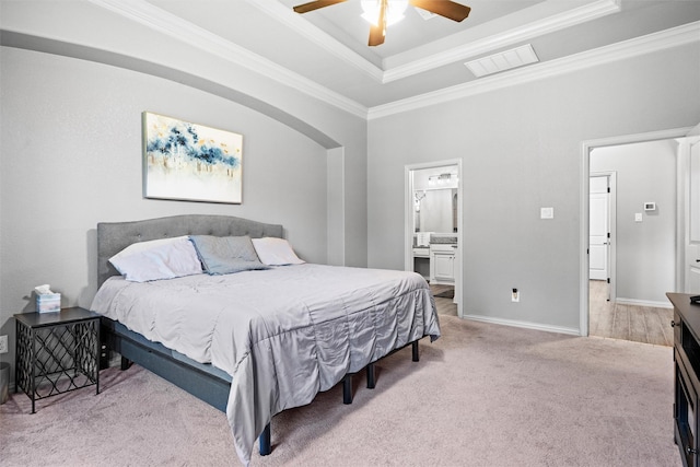 726 County Road 3355, Paradise, TX 76073 - bedroom with a raised ceiling, ornamental molding, light carpet, ceiling fan, and ensuite bath