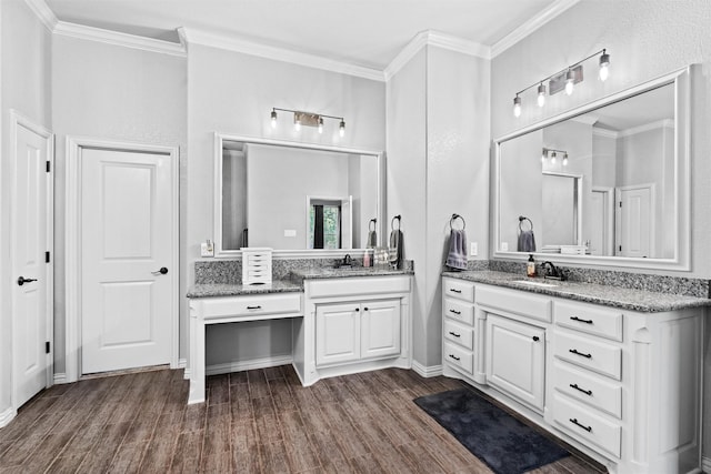 726 County Road 3355, Paradise, TX 76073 - full bathroom featuring two vanities, wood finished floors, and crown molding