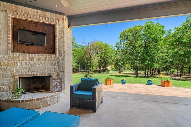 726 County Road 3355, Paradise, TX 76073 - view of patio with an outdoor stone fireplace, ceiling fan, and view of scattered trees
