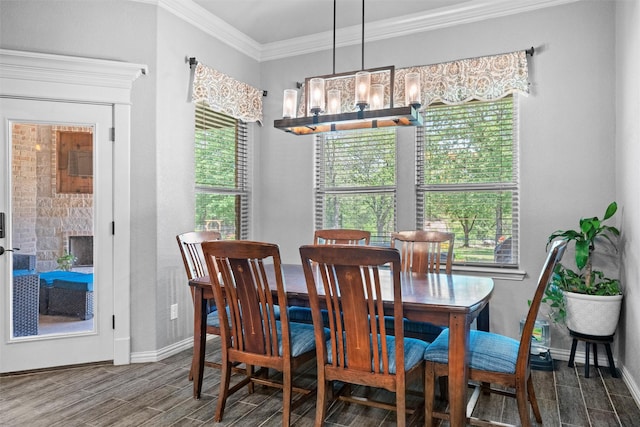 726 County Road 3355, Paradise, TX 76073 - dining space featuring crown molding, wood finish floors, and a chandelier