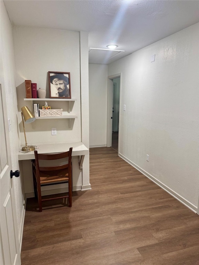 900 Boyd Ave, Lindale, TX 75701 - hallway featuring wood finished floors, baseboards, and a desk