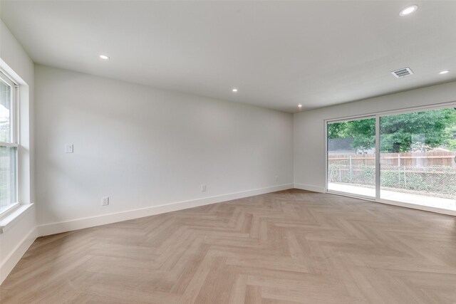 1447 Arizona Ave, Dallas, TX 75216 - spare room featuring baseboards and recessed lighting