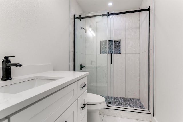 1447 Arizona Ave, Dallas, TX 75216 - full bath with a stall shower, toilet, and vanity