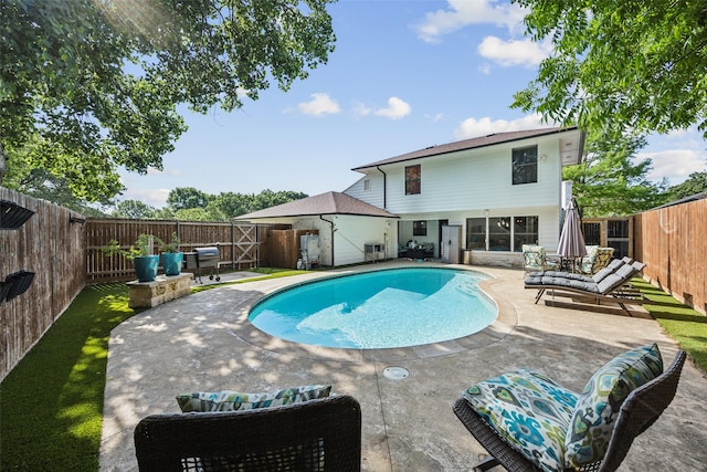 2902 Panhandle Dr, Grapevine, TX 76051 - view of swimming pool with a patio and a fenced backyard