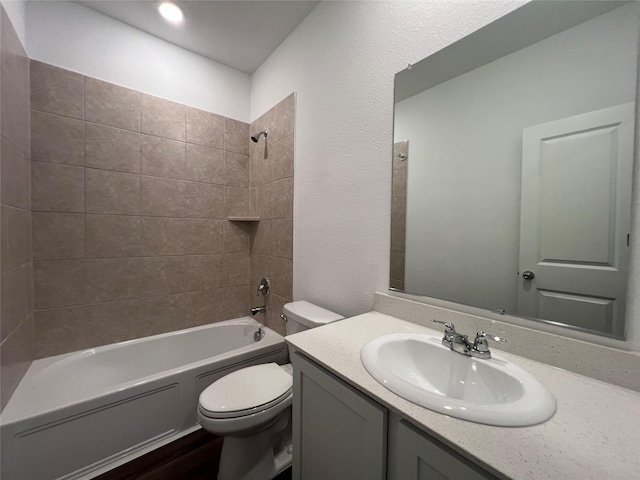 409 Petty Way, Fate, TX 75189 - bathroom featuring toilet,  shower combination, vanity, and wood finished floors