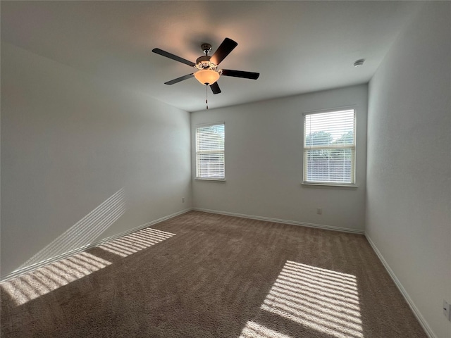 409 Petty Way, Fate, TX 75189 - carpeted spare room with baseboards and ceiling fan