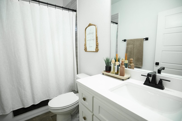 100 E 3rd St, Tolar, TX 76476 - bathroom featuring toilet, vanity, and a shower with shower curtain