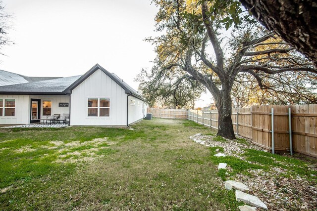 100 E 3rd St, Tolar, TX 76476 - view of yard featuring a patio and cooling unit
