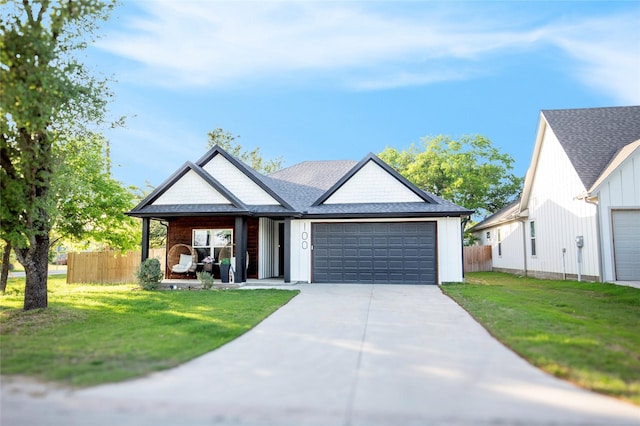 100 E 3rd St, Tolar, TX 76476 - view of front of house with an attached garage, concrete driveway, and roof with shingles