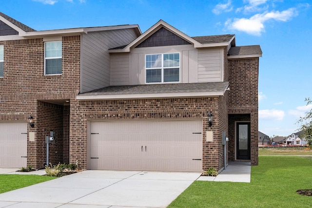 736 Carson Ln, Pilot Point, TX 76258 - view of front facade with brick siding, an attached garage, a front yard, and concrete driveway