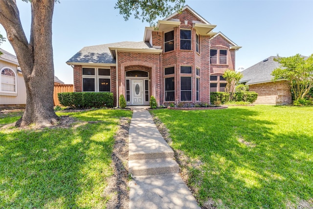 1729 Sheffield Dr, Garland, TX 75040 - traditional-style home featuring brick siding and roof with shingles