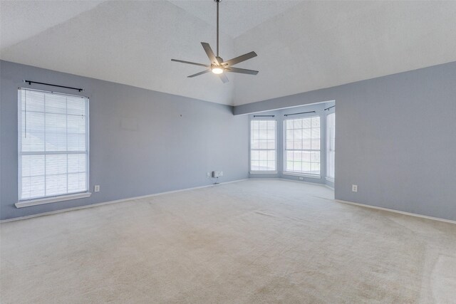 1729 Sheffield Dr, Garland, TX 75040 - unfurnished room featuring ceiling fan, carpet floors, baseboards, and high vaulted ceiling