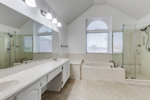 1729 Sheffield Dr, Garland, TX 75040 - full bath featuring lofted ceiling, plenty of natural light, double vanity, a shower stall, and a garden tub