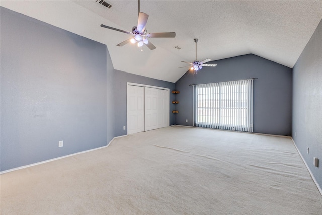 1729 Sheffield Dr, Garland, TX 75040 - unfurnished bedroom with carpet floors, lofted ceiling, a closet, baseboards, and ceiling fan