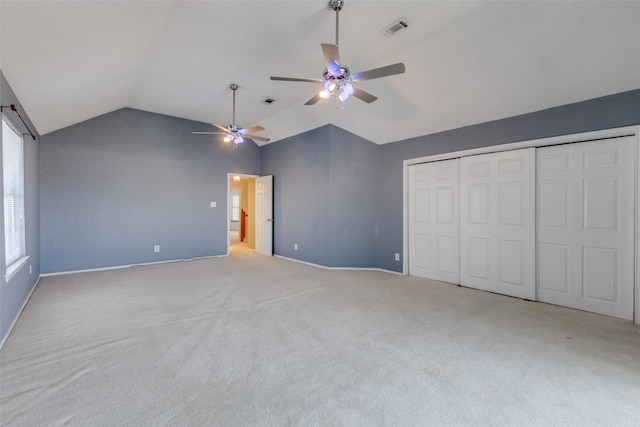 1729 Sheffield Dr, Garland, TX 75040 - unfurnished bedroom with vaulted ceiling, carpet flooring, a closet, ceiling fan, and baseboards