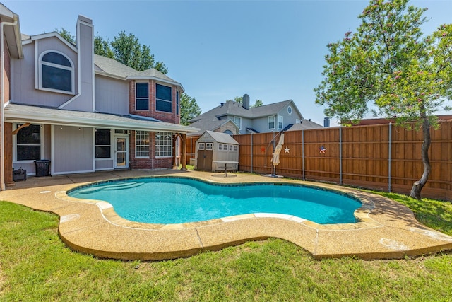 1729 Sheffield Dr, Garland, TX 75040 - view of pool with a shed, a fenced backyard, an outdoor structure, and a patio area