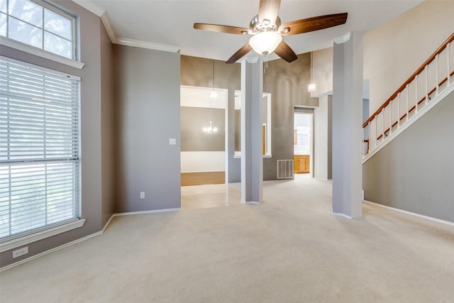 1729 Sheffield Dr, Garland, TX 75040 - unfurnished living room featuring a ceiling fan, carpet floors, a chandelier, stairway, and ornamental molding