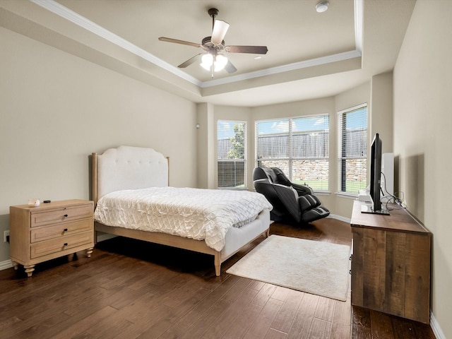 214 Crestbrook Dr, Rockwall, TX 75087 - bedroom with a raised ceiling, dark wood-style floors, ornamental molding, baseboards, and a ceiling fan