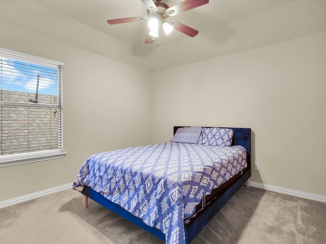 214 Crestbrook Dr, Rockwall, TX 75087 - carpeted bedroom featuring baseboards and ceiling fan