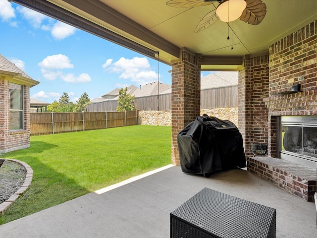 214 Crestbrook Dr, Rockwall, TX 75087 - view of patio with grilling area and a ceiling fan