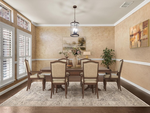 214 Crestbrook Dr, Rockwall, TX 75087 - dining room featuring plenty of natural light, wood finished floors, baseboards, crown molding, and a textured wall