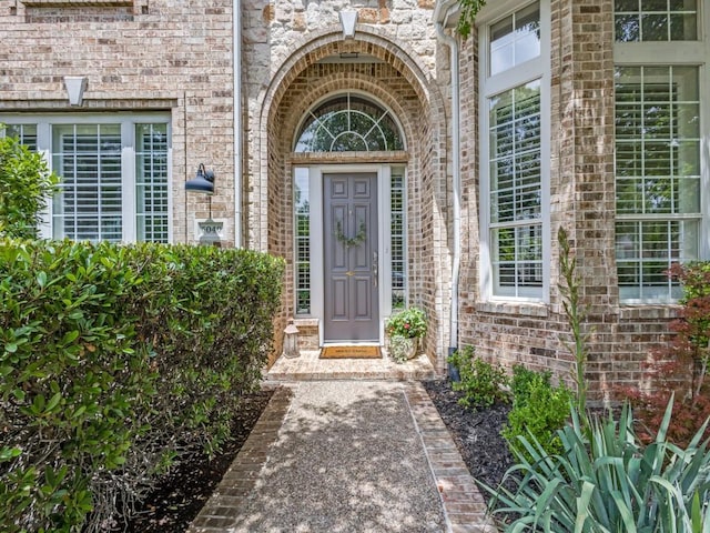 5040 Loma Alta Dr, Frisco, TX 75034 - view of exterior entry featuring brick siding