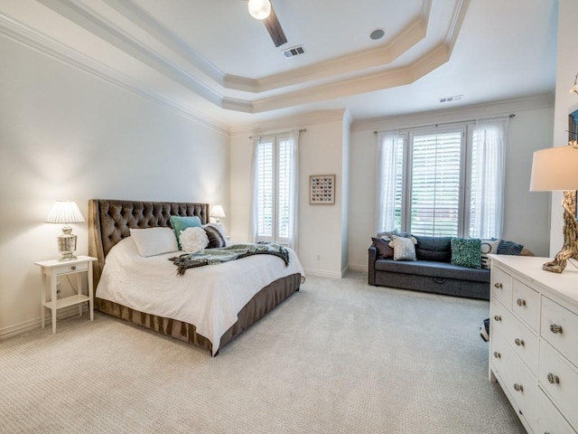 5040 Loma Alta Dr, Frisco, TX 75034 - bedroom featuring a tray ceiling, multiple windows, crown molding, light carpet, and ceiling fan