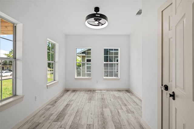 807 S Edgefield Ave, Dallas, TX 75208 - spare room with light wood-type flooring and baseboards