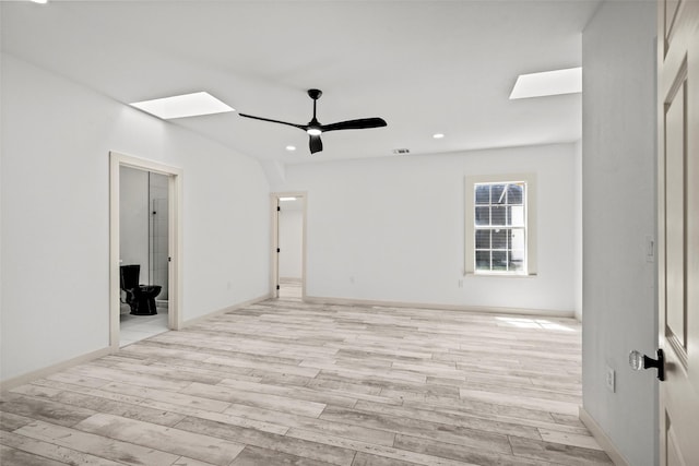 807 S Edgefield Ave, Dallas, TX 75208 - empty room with a skylight, light wood-type flooring, recessed lighting, ceiling fan, and baseboards
