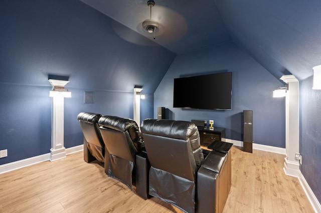113 Welford Ln, Southlake, TX 76092 - home theater featuring light wood finished floors, lofted ceiling, ornate columns, and baseboards