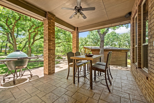 113 Welford Ln, Southlake, TX 76092 - view of patio featuring outdoor dining area, ceiling fan, and view of wooded area