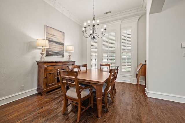 113 Welford Ln, Southlake, TX 76092 - dining space with a chandelier, crown molding, dark wood-style flooring, and baseboards