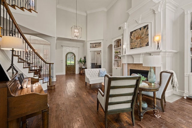 113 Welford Ln, Southlake, TX 76092 - entryway featuring stairway, a fireplace, baseboards, dark wood-type flooring, and a high ceiling