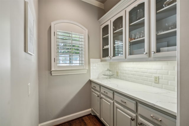 6005 Arboretum Dr, Frisco, TX 75034 - bar featuring tasteful backsplash, dark wood finished floors, and baseboards