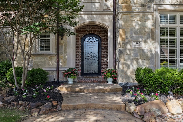 6005 Arboretum Dr, Frisco, TX 75034 - property entrance with stone siding and brick siding