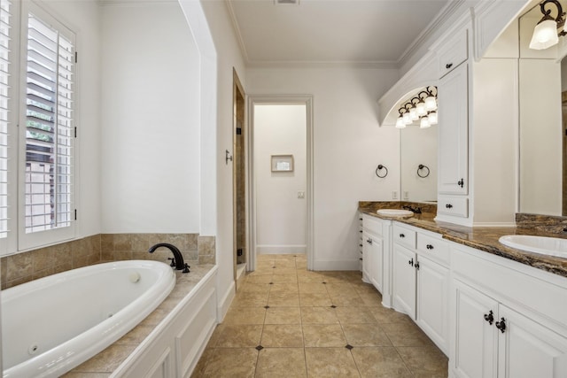 6005 Arboretum Dr, Frisco, TX 75034 - full bathroom featuring a tub with jets, healthy amount of natural light, double vanity, crown molding, and tile patterned floors