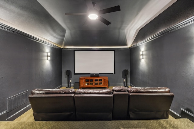 6005 Arboretum Dr, Frisco, TX 75034 - home theater with a ceiling fan, a textured wall, baseboards, vaulted ceiling, and a raised ceiling