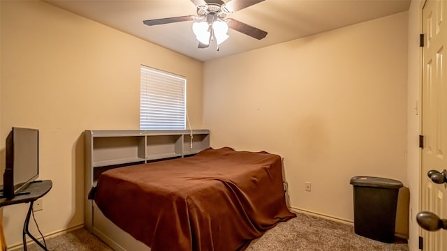 750 S First Ave, Stephenville, TX 76401 - carpeted bedroom featuring baseboards and ceiling fan