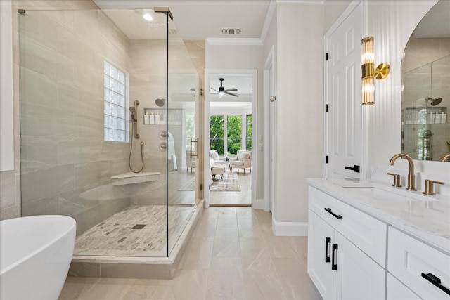 1740 Highland Meadows Dr, Prosper, TX 75078 - bathroom featuring a ceiling fan, a freestanding bath, a shower stall, vanity, and plenty of natural light