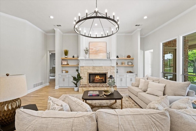 1740 Highland Meadows Dr, Prosper, TX 75078 - living area with a chandelier, recessed lighting, light wood-style flooring, crown molding, and a fireplace
