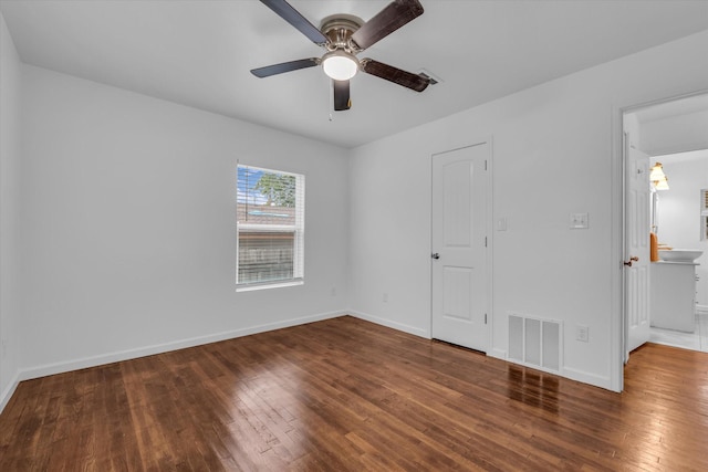 2305 Joey Dr, Waco, TX 76711 - spare room featuring wood finished floors, baseboards, and ceiling fan