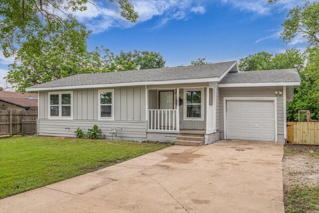 2305 Joey Dr, Waco, TX 76711 - ranch-style house with a garage, board and batten siding, concrete driveway, and a shingled roof